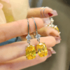 Luxurious artificial yellow diamond rectangular earrings set with high - carbon diamonds, pink zirconium ear hooks, versatile, with a sense of temperament and high - grade. - Image 5