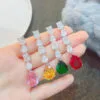 Ins influencer's popular fashion retro color gemstone imitation Argyle pink sapphire emerald large earrings - Image 6