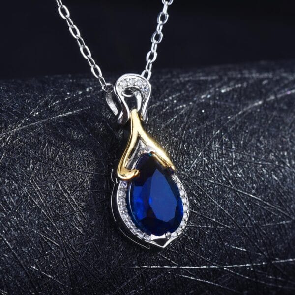 The new fashion mermaid tears pendant online red live hot selling two-color electroplated sapphire color treasure necklace - Image 4