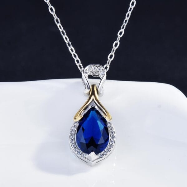 The new fashion mermaid tears pendant online red live hot selling two-color electroplated sapphire color treasure necklace
